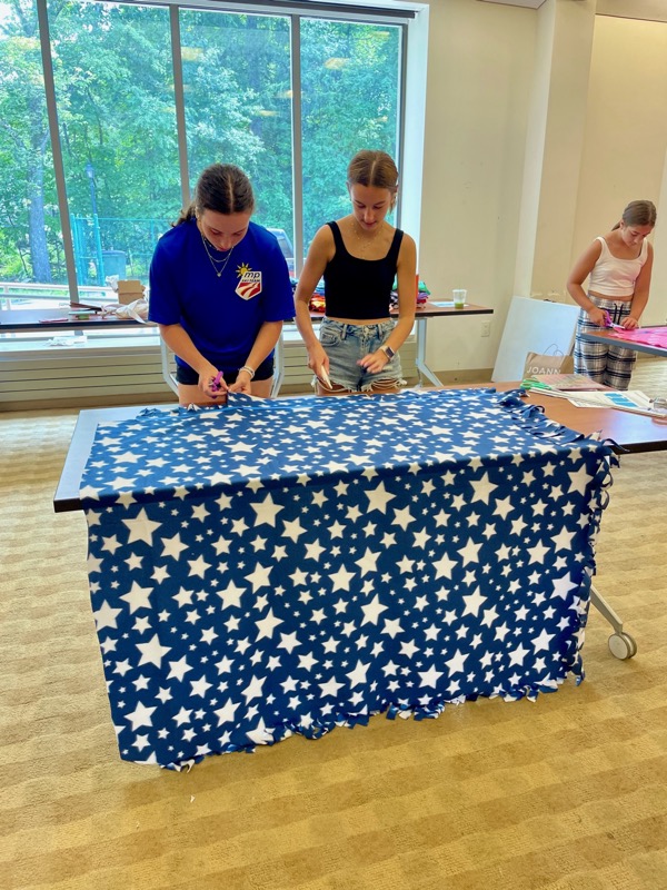 Handmade blankets ready for delivery to families in crisis