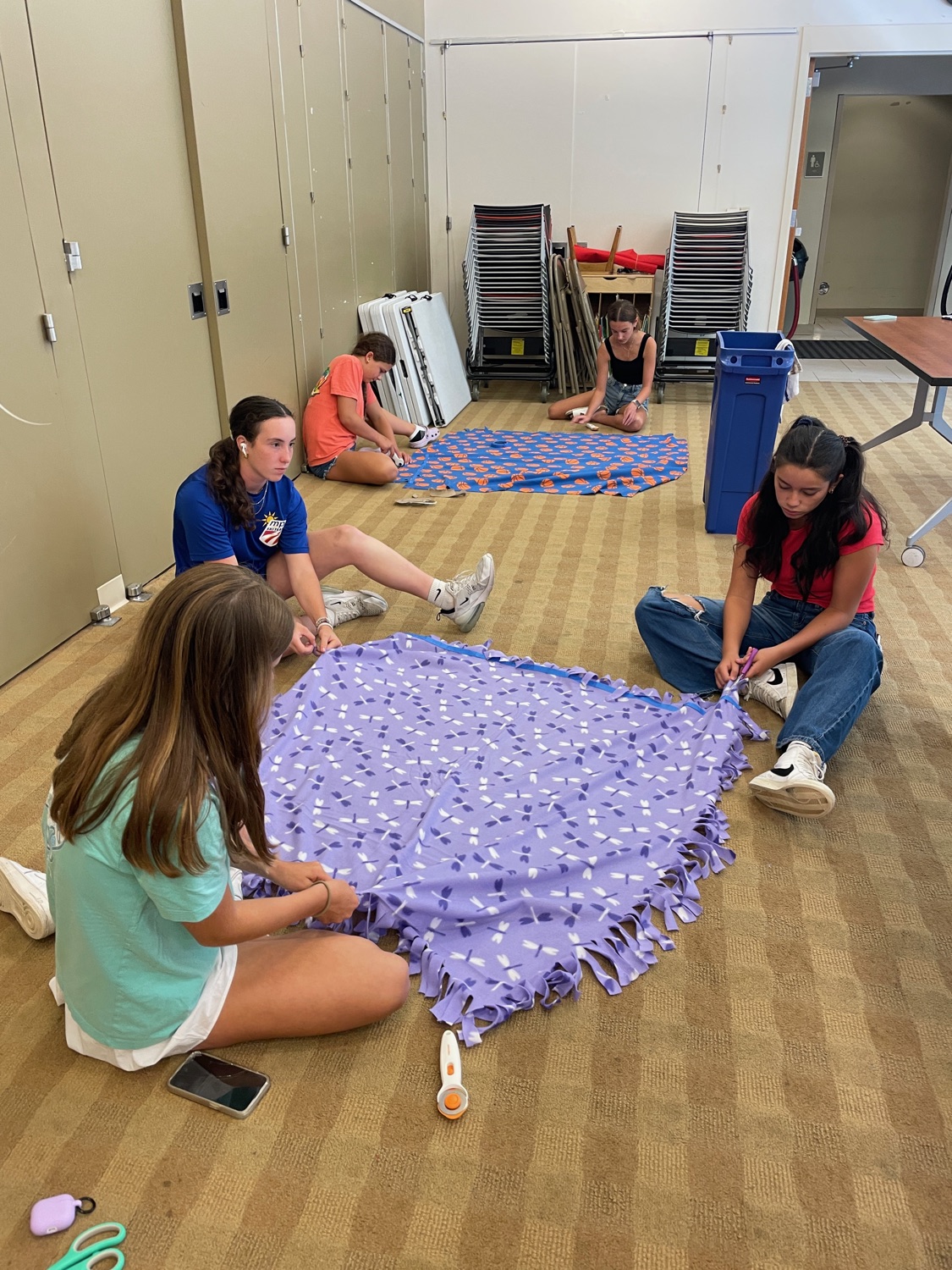 Ramsey Blanket Corps community members with completed blankets