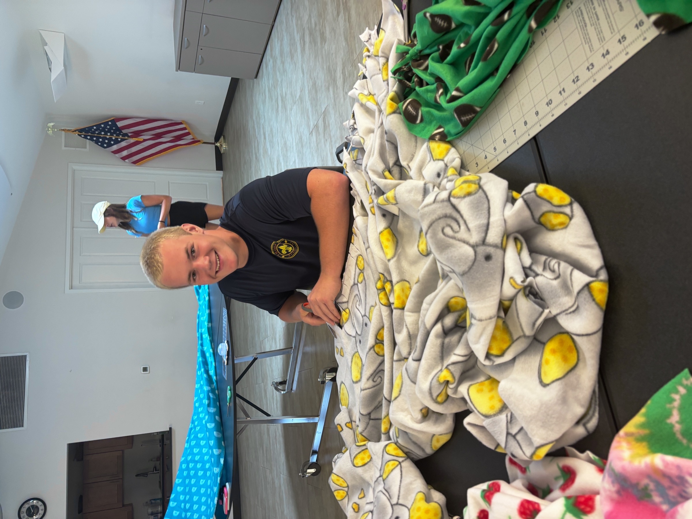 Participants at the Community No-Sew Fleece Tie Blanket Making Event