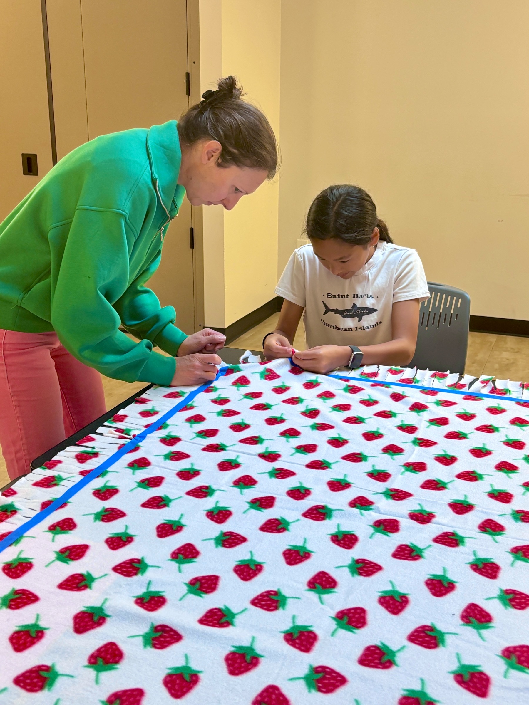 A completed handmade fleece tie blanket